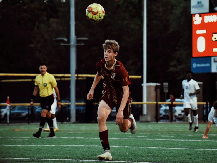 a  getting ready to kick a soccer ball