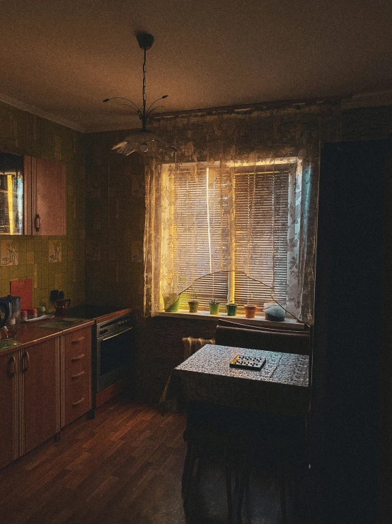 a room with an oven and some wooden cabinets