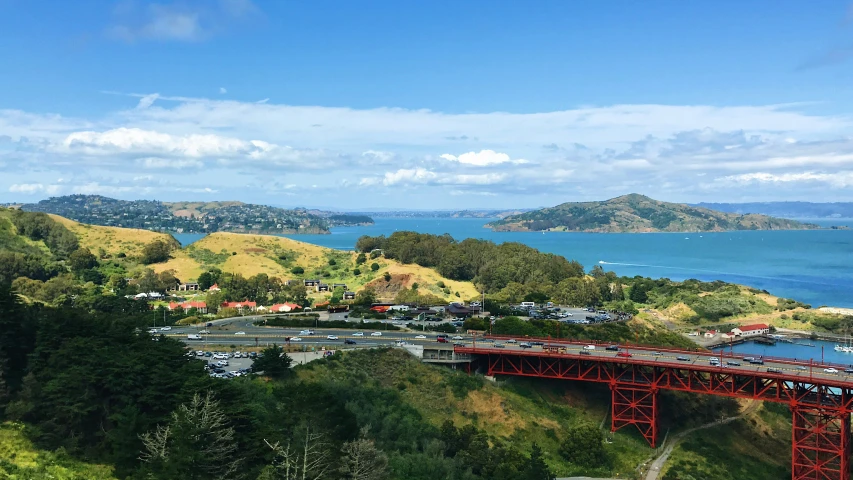 the red bridge is overlooking an amazing view of the ocean