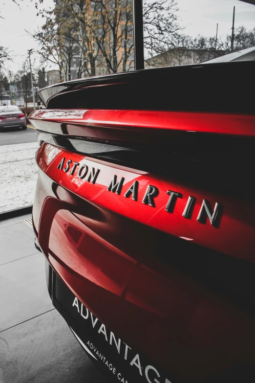 red cars are parked on the side of the road