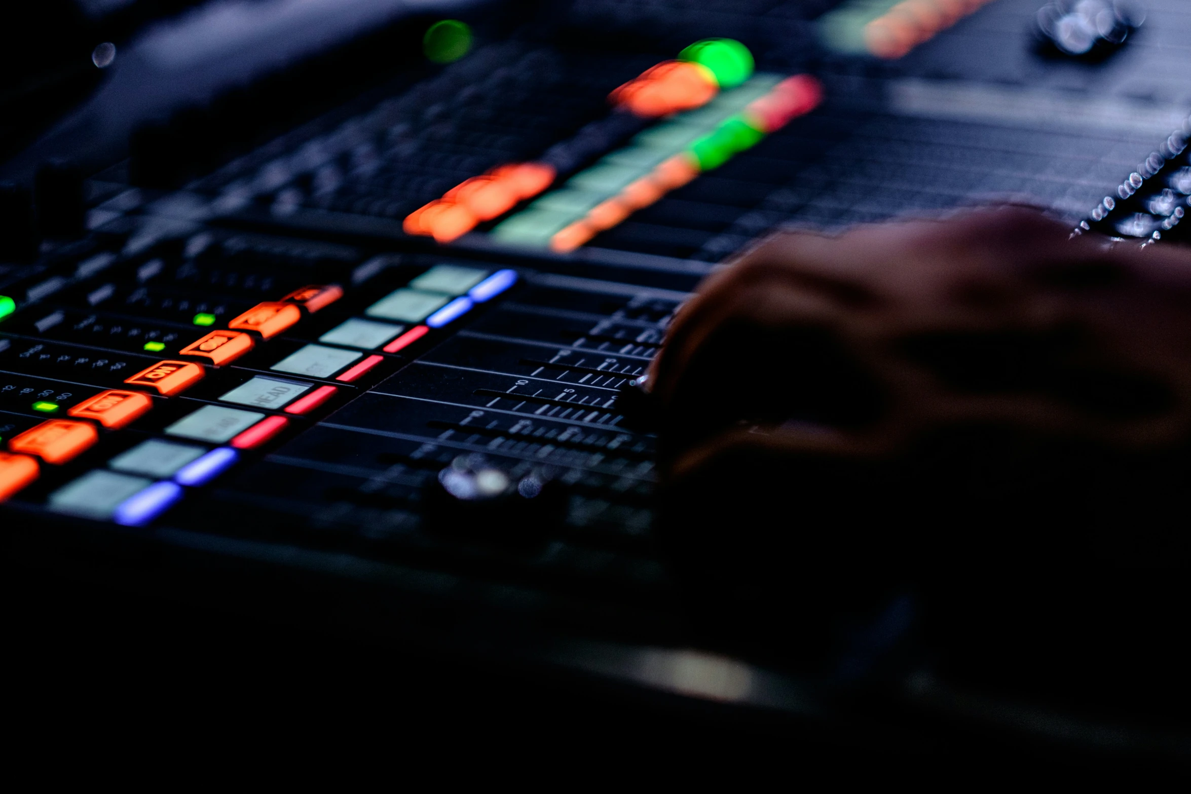 an electronic mixing board with the light on