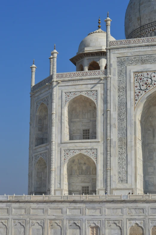 a building with several large pillars and domes