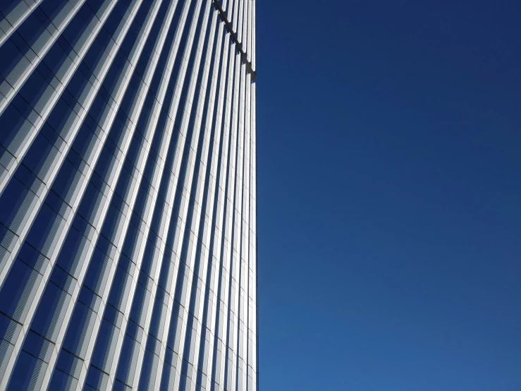 a tall building against the blue sky