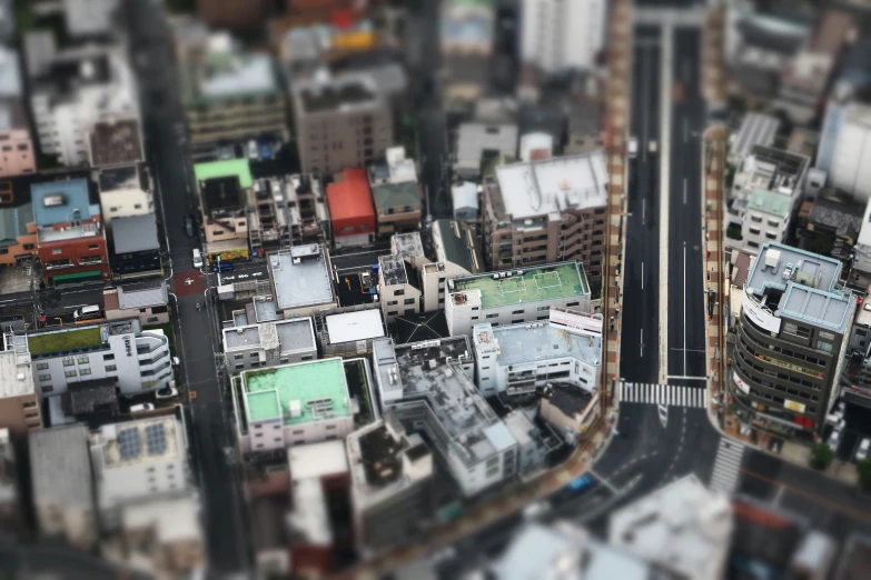 an aerial view of two streets and buildings