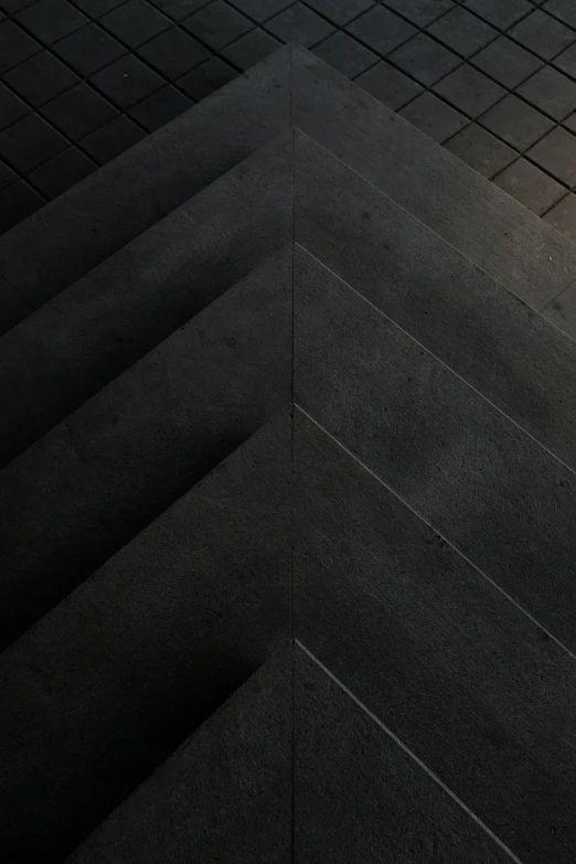 a person walking down stairs in a building