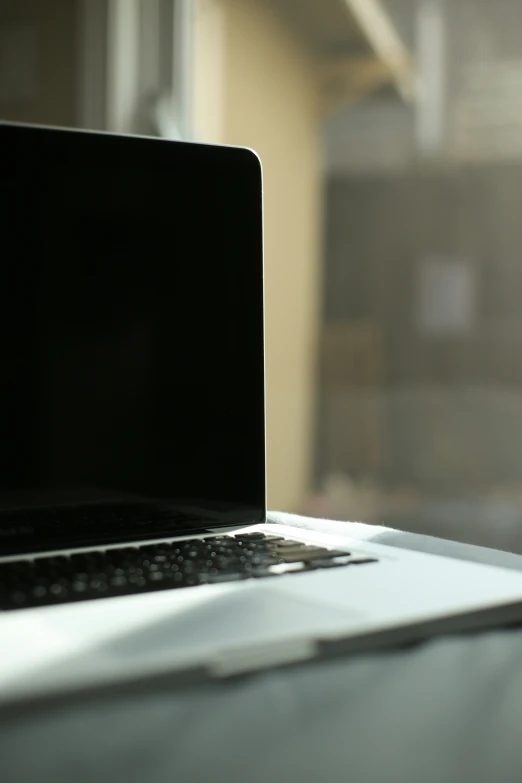 this is an open laptop computer on top of a table