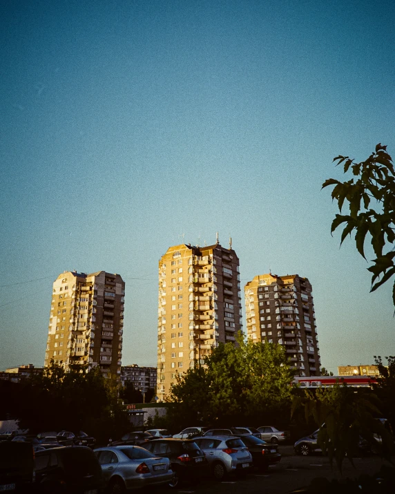 an outside parking lot with many parked cars