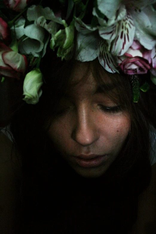 a woman with flowers in her hair