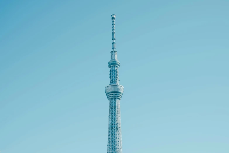 a tall tower next to the sky in the day