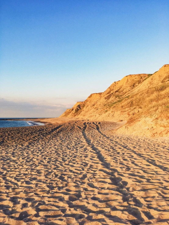 an image of beach with the sand covered by sand