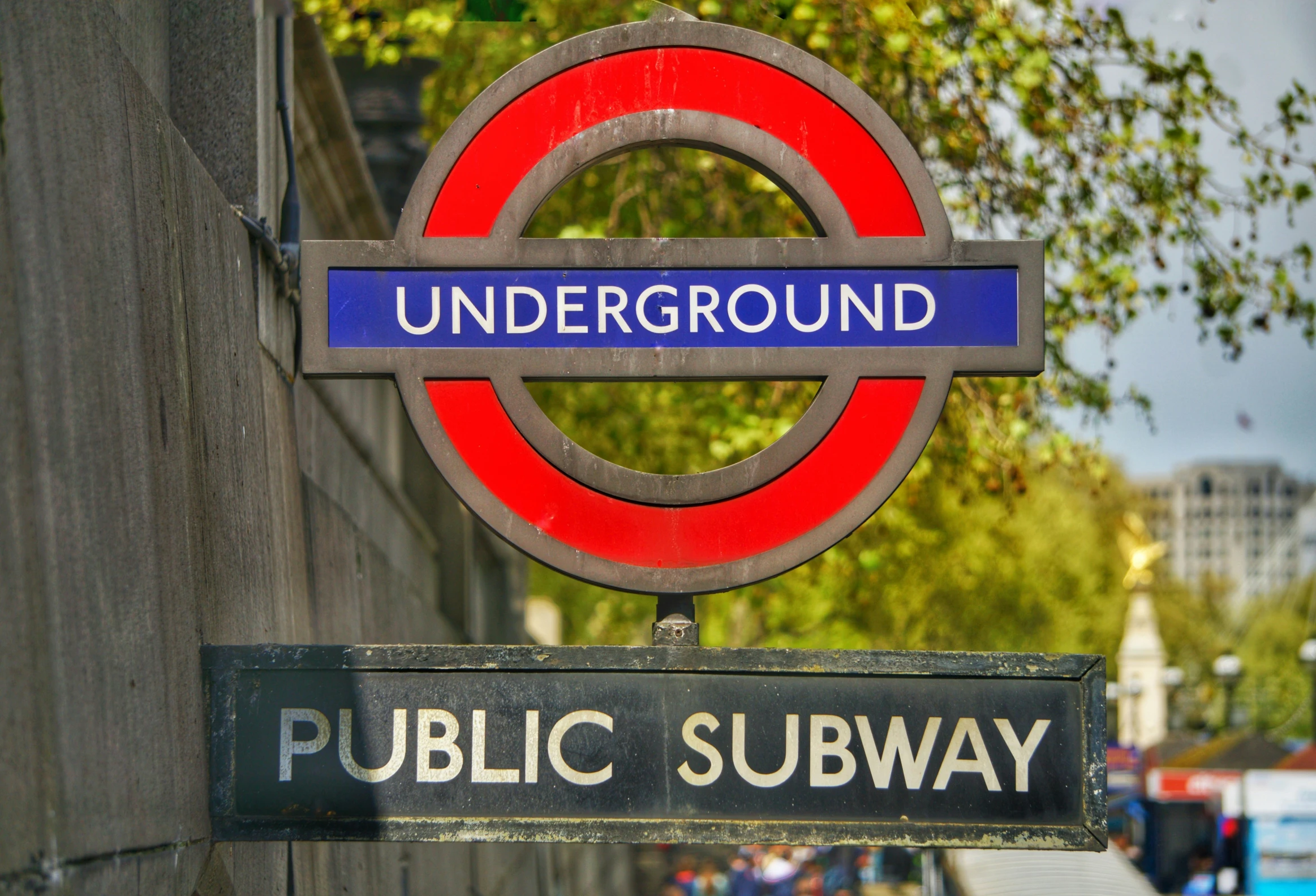 a sign of a public subway and underground sign