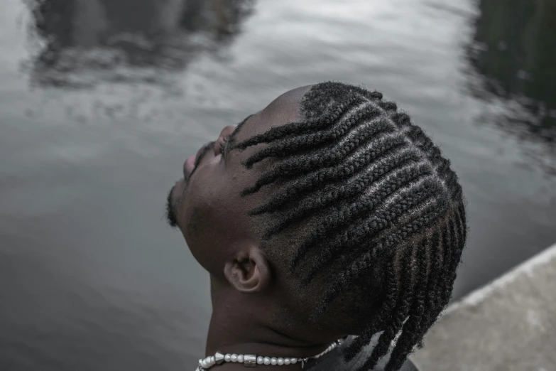 a woman with an updo with twists on her hair