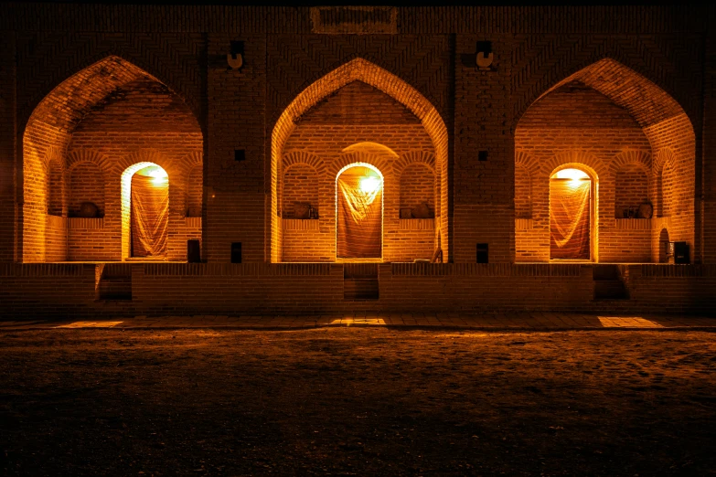 the inside of a building lit up at night