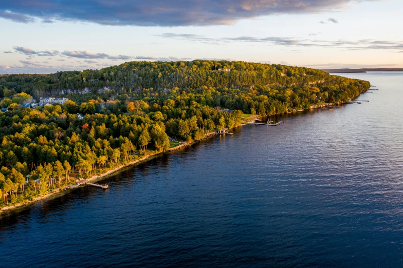 this is an aerial po of a beautiful island with lots of green trees