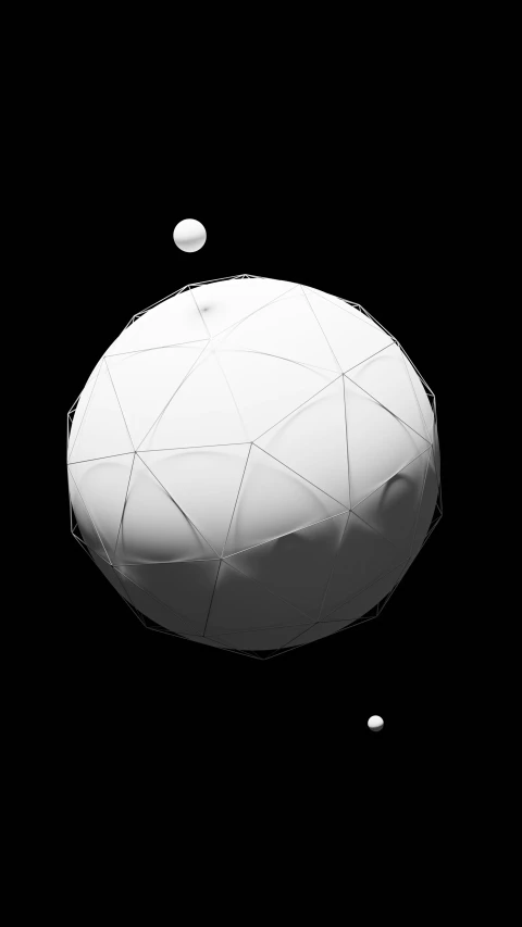 an image of a black and white ball and a black background