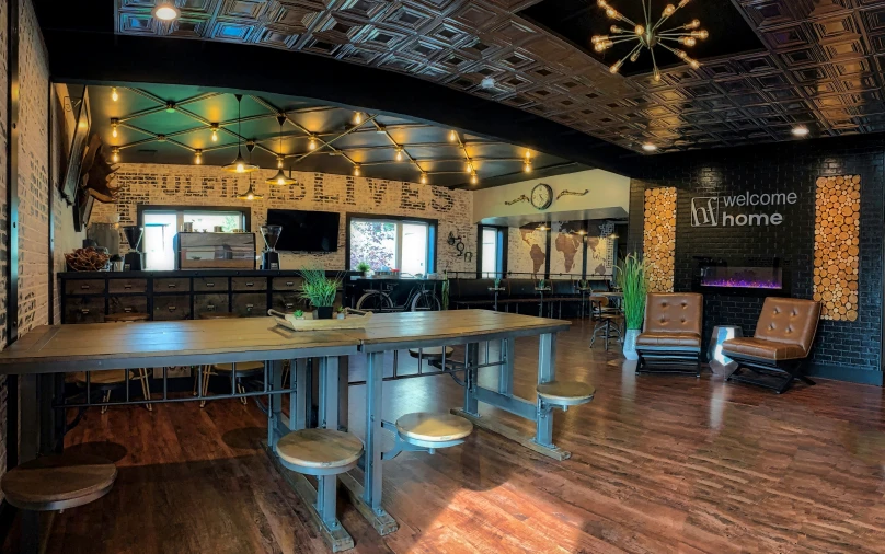 a large wooden bar sitting inside of a restaurant