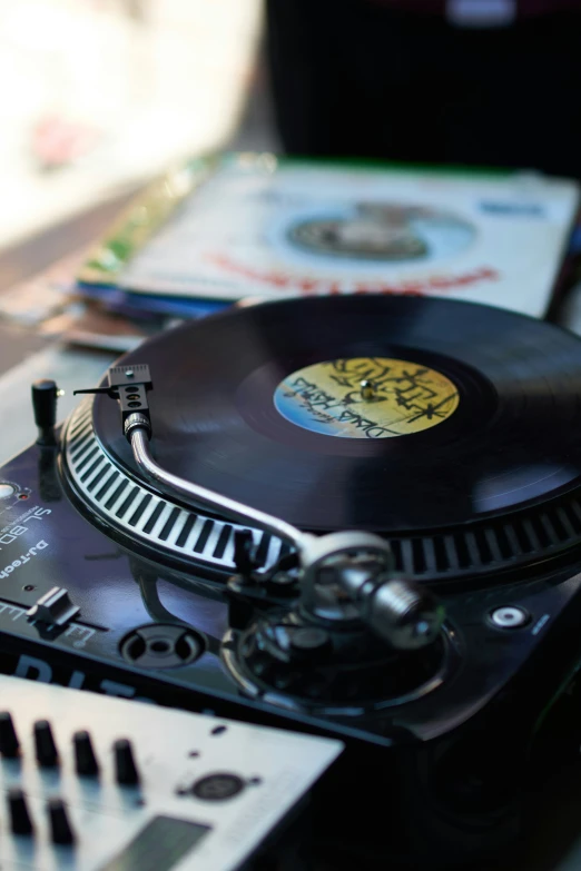 a turntable sitting on top of a table