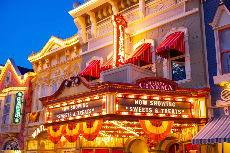 a very colorful building with some signs for lights on the side