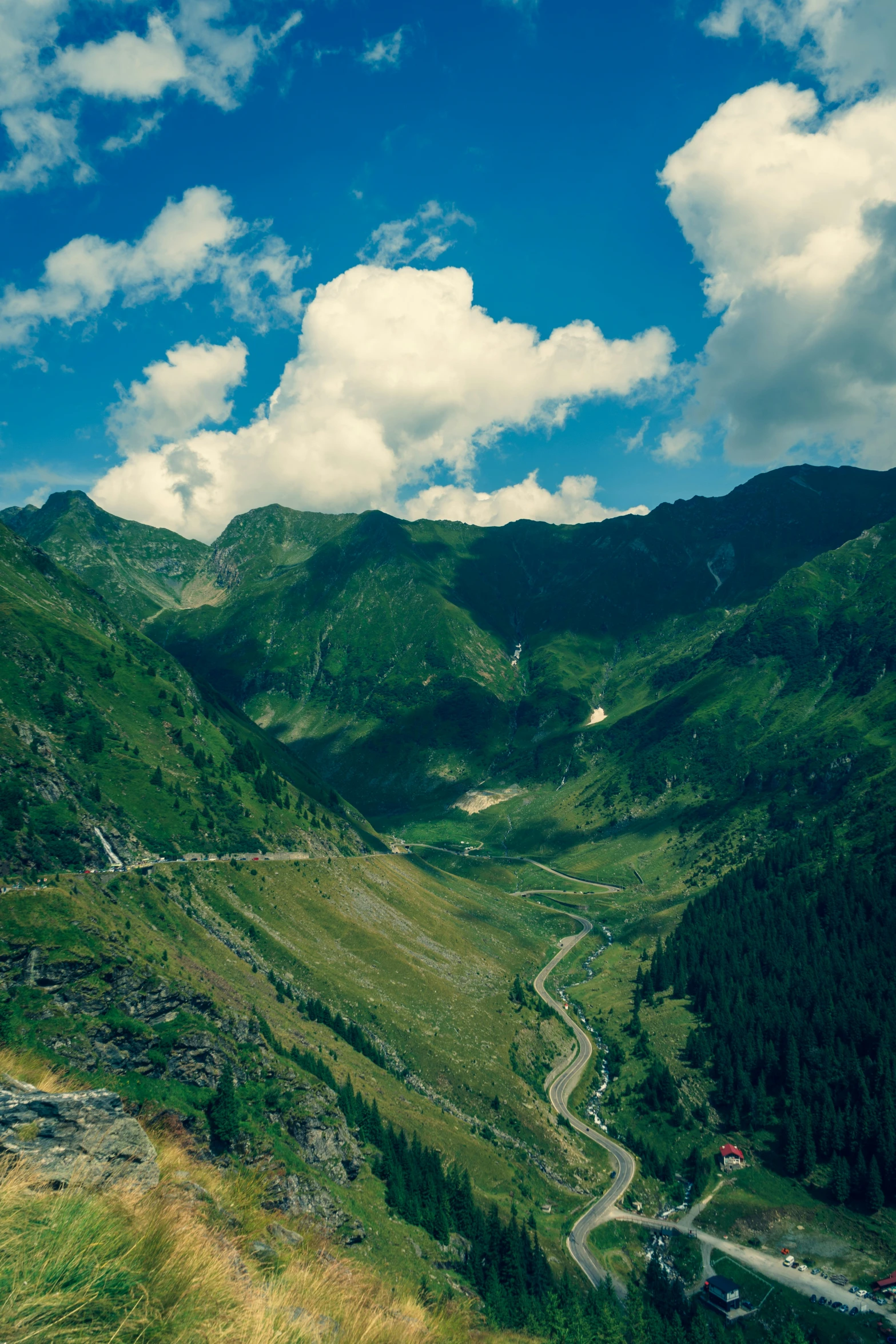 a scenic view looking at a road in the valley