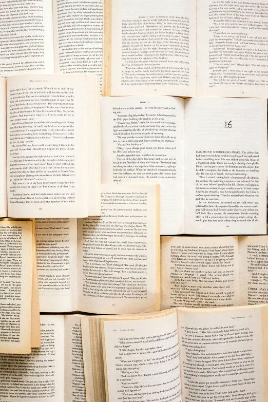 many old books sitting on top of each other