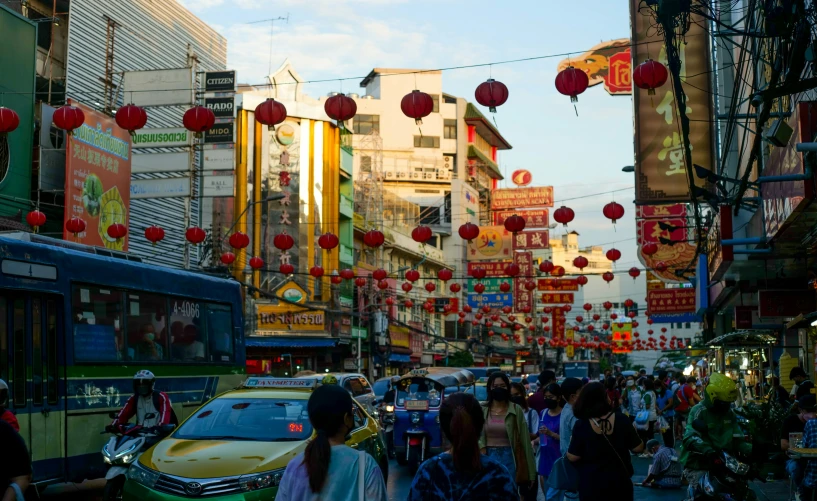 there are many people walking down the street