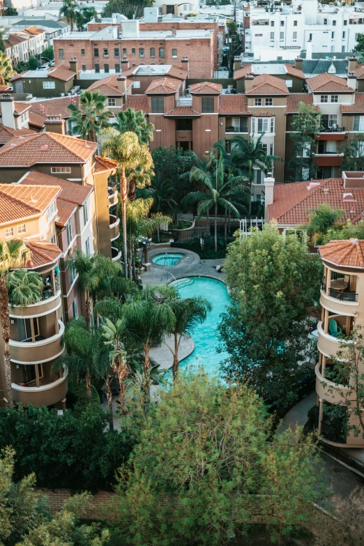 an aerial view of a resort swimming pool