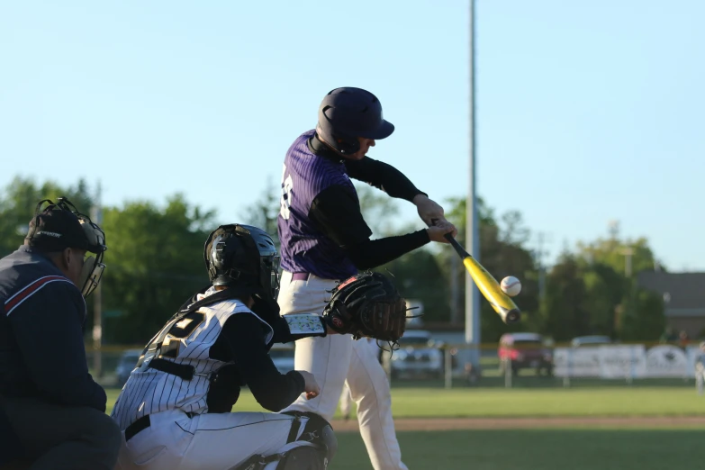 a baseball player preparing to hit a pitch