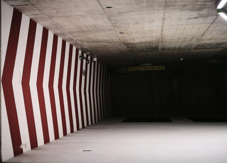 a room that has red and white walls in it