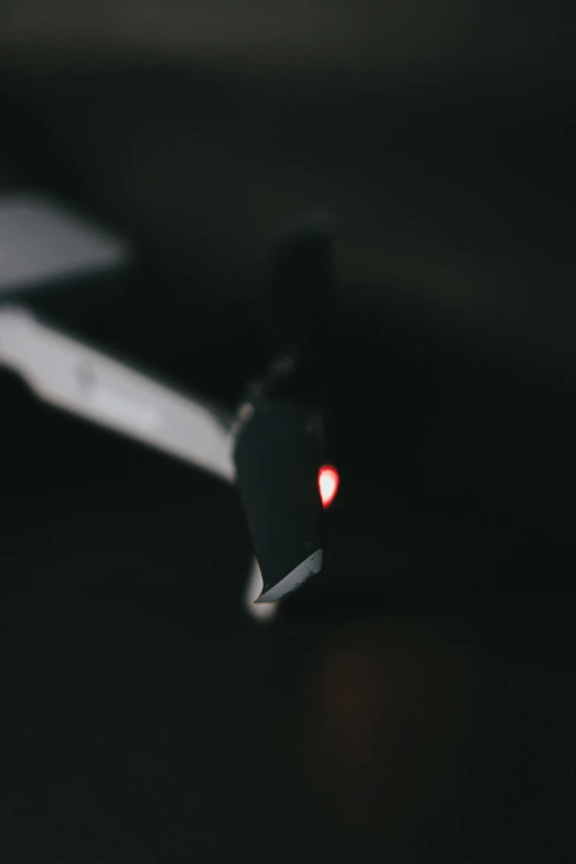 the back light of a computer mouse in a dark room