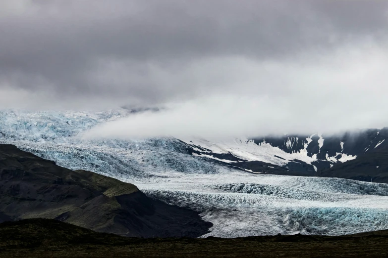 the mountains have snow and ice on them