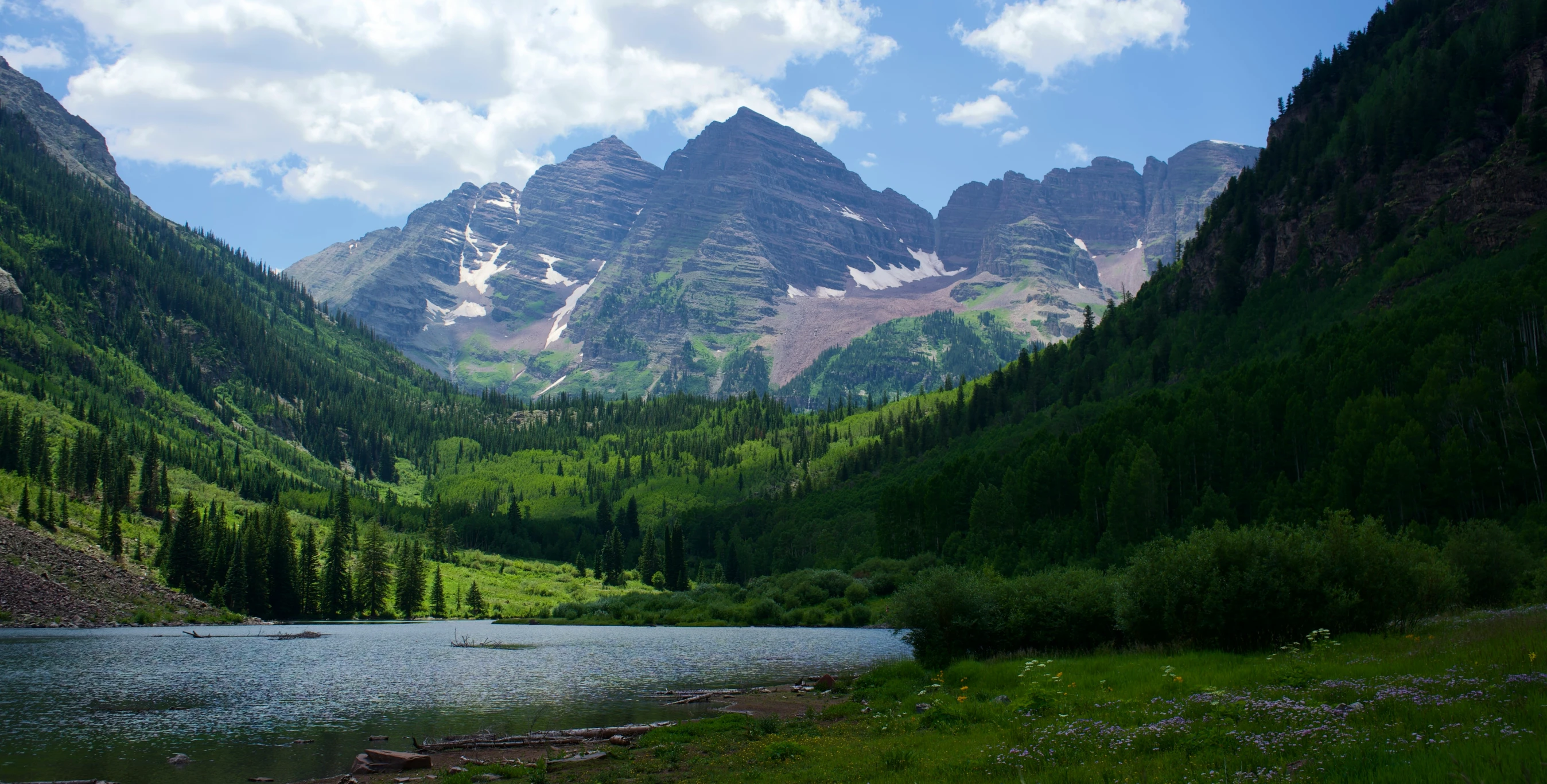 there is a mountain river near the edge of the mountain