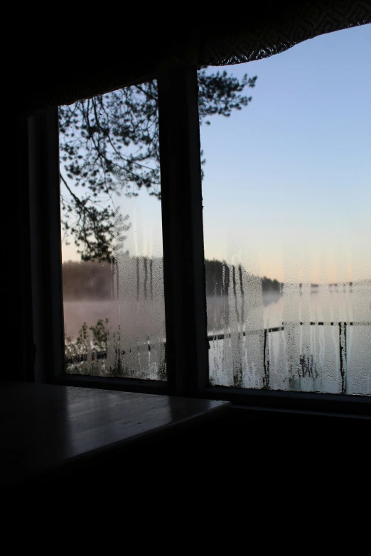 the view from inside a building in front of a window