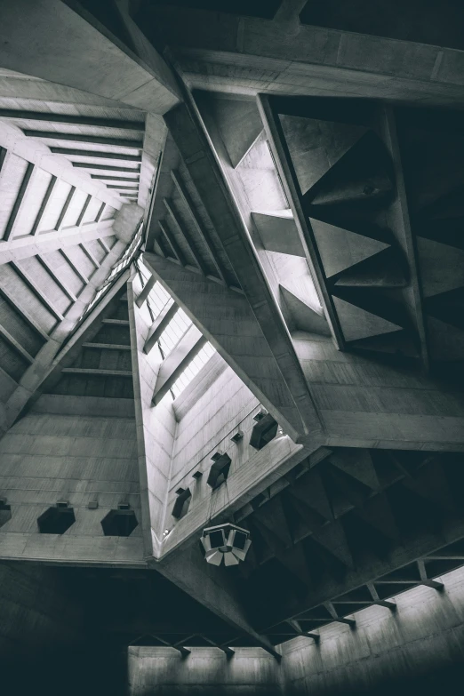 the architecture of an office building in black and white