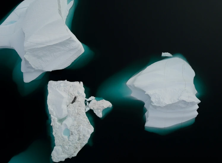 two pieces of ice lying on top of each other