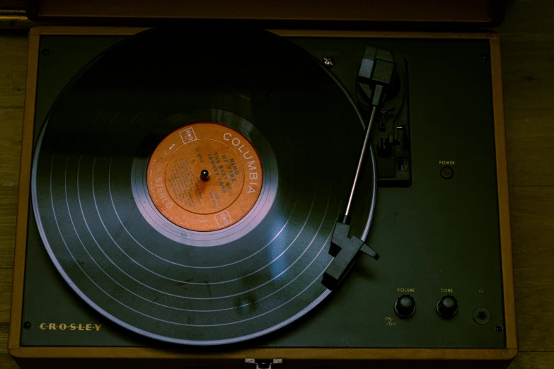 an old fashioned record player with a record