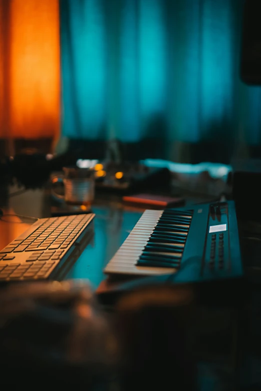 an old keyboard is next to a new computer keyboard