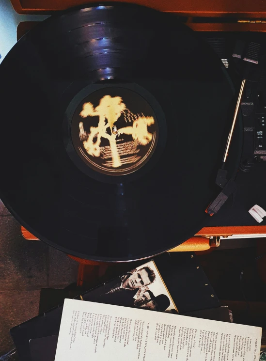 a record player in an office plays music