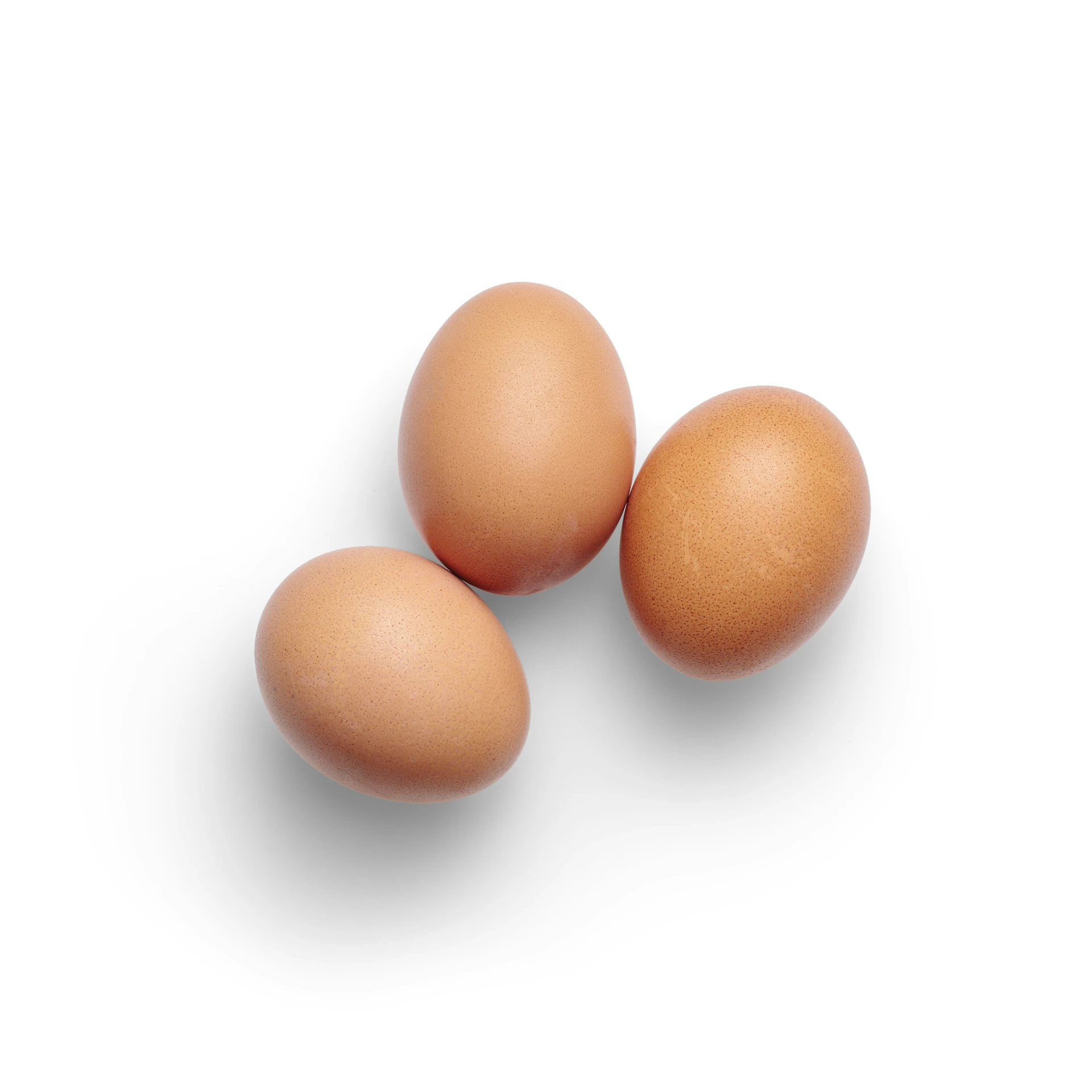 three eggs in two different shades are shown