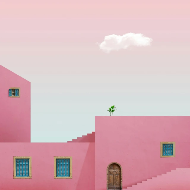a pink building has blue windows and steps