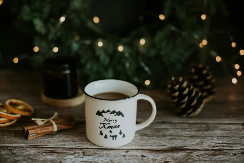 a merry kreme cup on top of a table