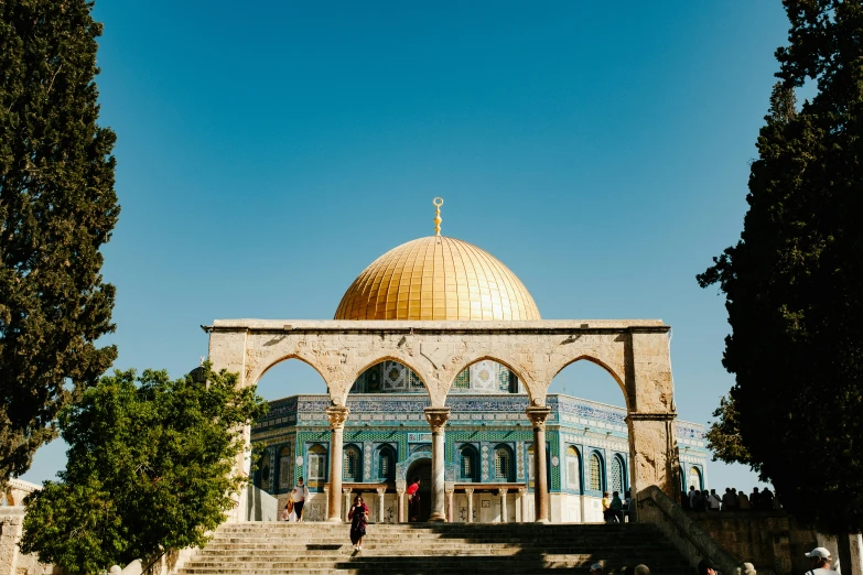 an arched stone wall with arches is built in the style of a dome