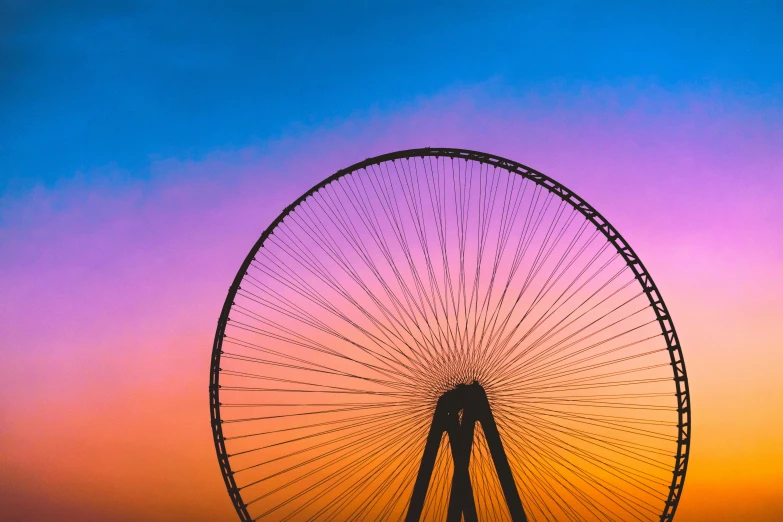 the ferris wheel at sunset taken from the boardwalk in ocean isle