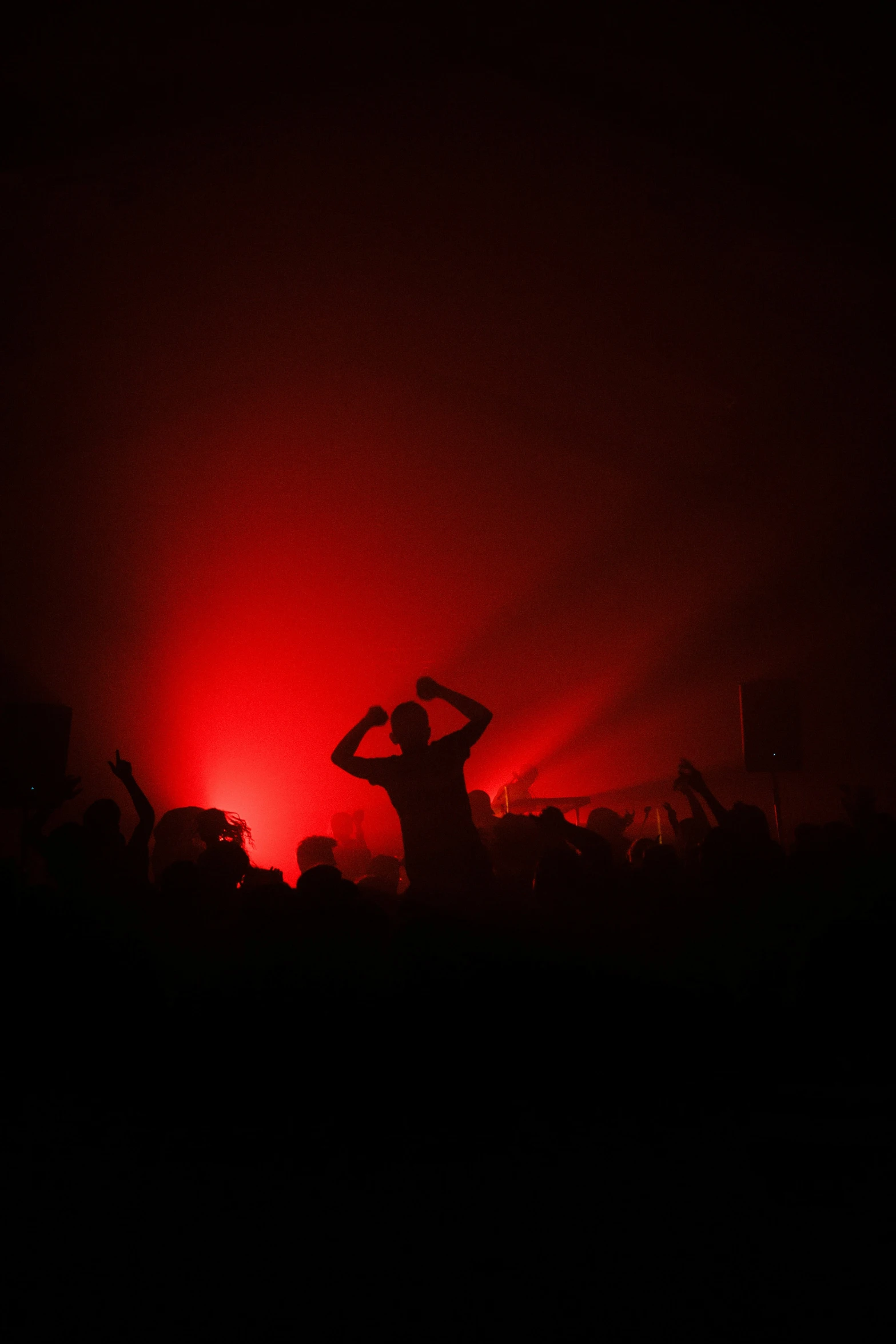 a man is in the middle of an illuminated room