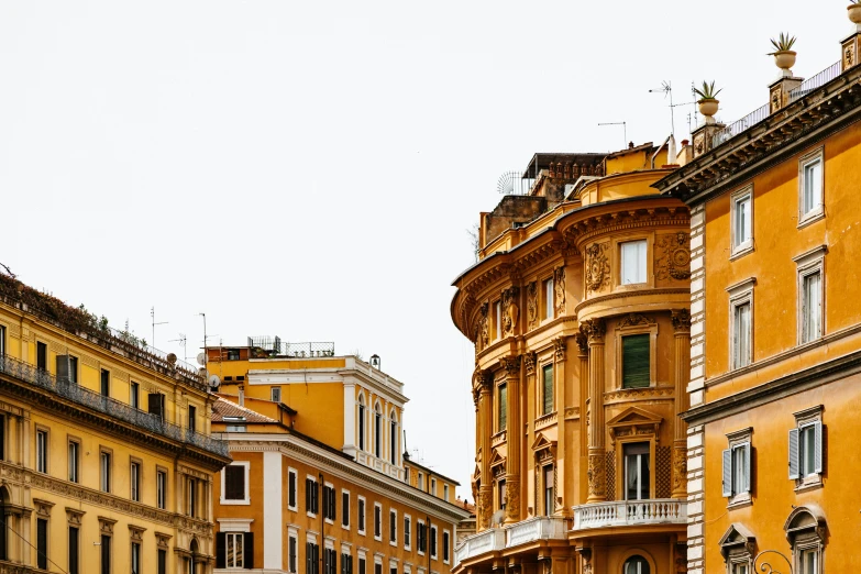 old buildings line a street with a clock