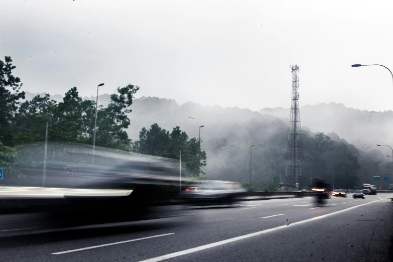 the cars are moving fast on a freeway