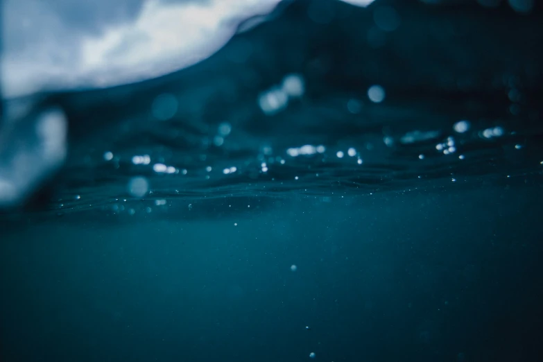 underwater s of an ocean with the sky in the background