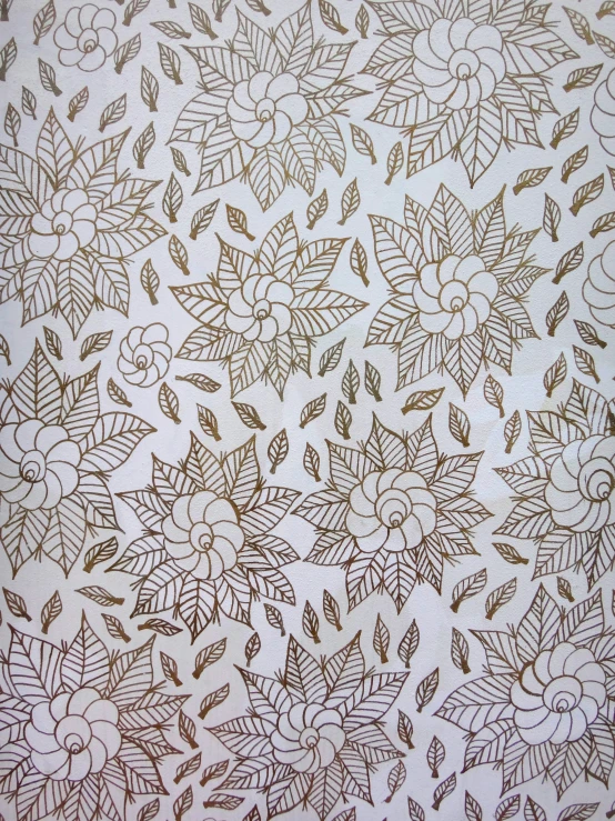 a fabric with leaves on it and brown leaves on the side