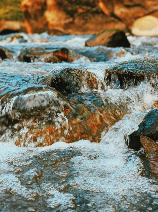 there are rocks with water running through them