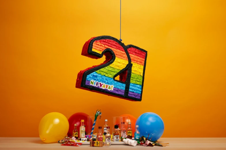 an image of a number twenty sign hanging on a string