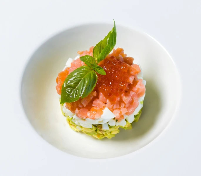 a plate topped with two small sandwiches covered in jelly